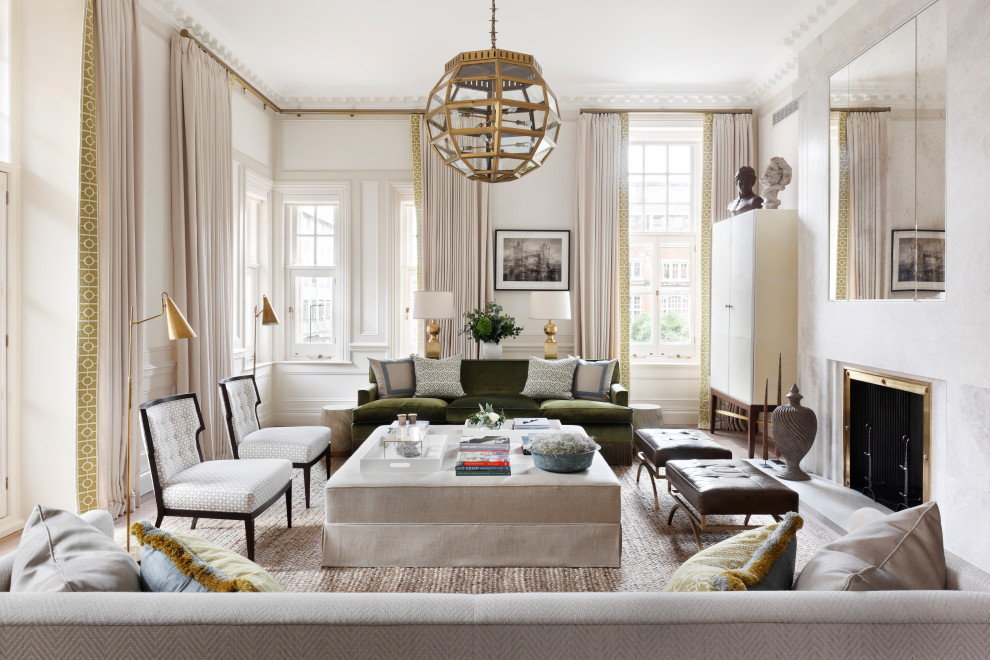 Design ideas for an expansive traditional formal living room in London with white walls, a standard fireplace, a tiled fireplace surround, beige floors and wainscoting.