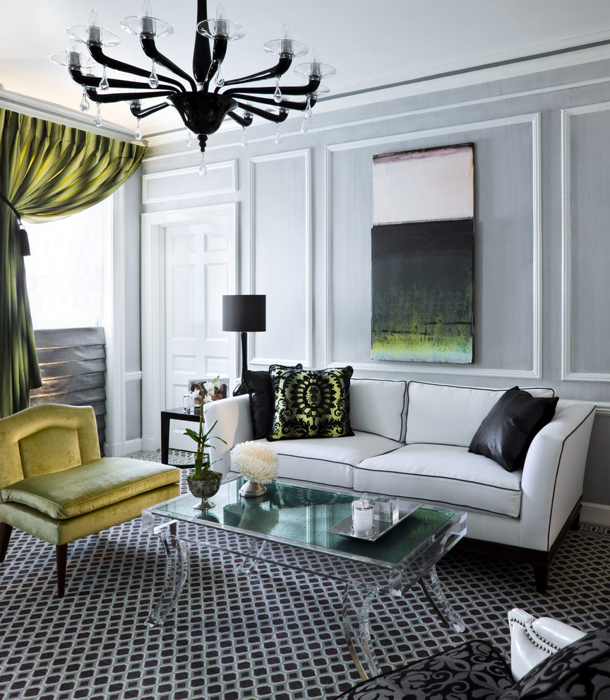 На фото: парадная, изолированная гостиная комната среднего размера в современном стиле с серыми стенами, ковровым покрытием, стандартным камином и фасадом камина из плитки