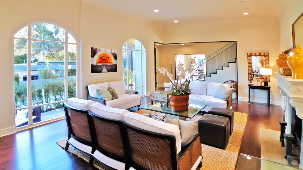 This is an example of a large mediterranean enclosed living room in Los Angeles with beige walls.