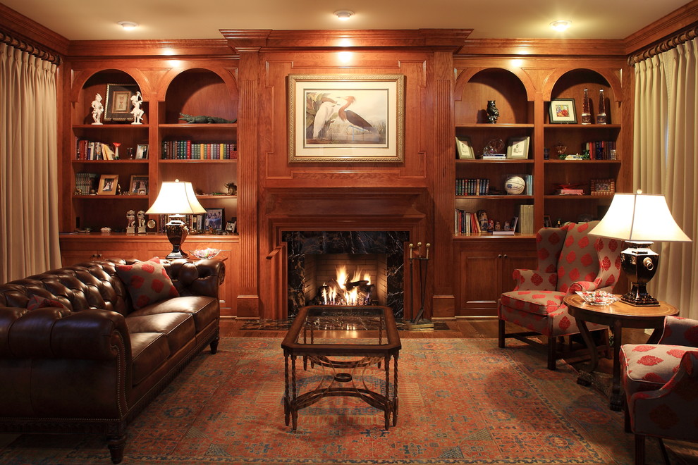 This is an example of a medium sized traditional formal open plan living room in Raleigh with brown walls, dark hardwood flooring, a standard fireplace, a stone fireplace surround and no tv.