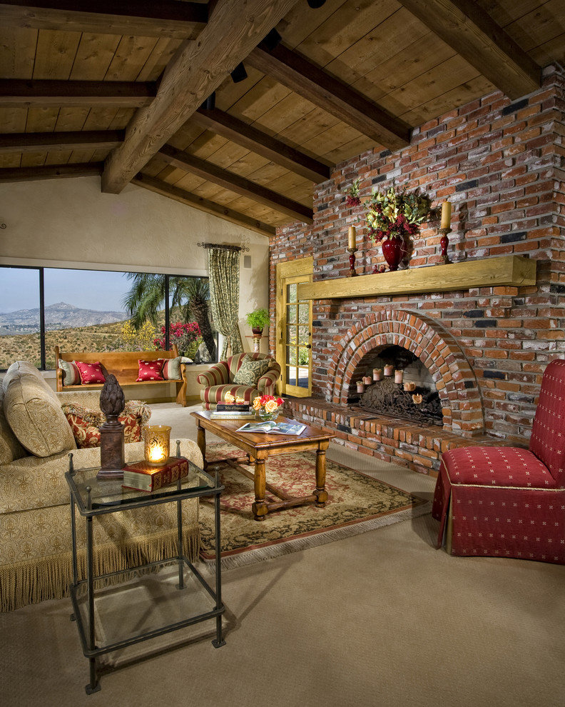 Inspiration for a rustic living room in San Diego with a brick fireplace surround.
