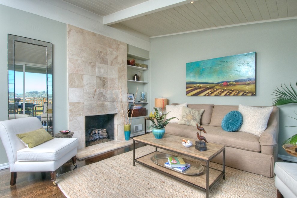 Trendy living room photo in San Francisco with blue walls and a standard fireplace