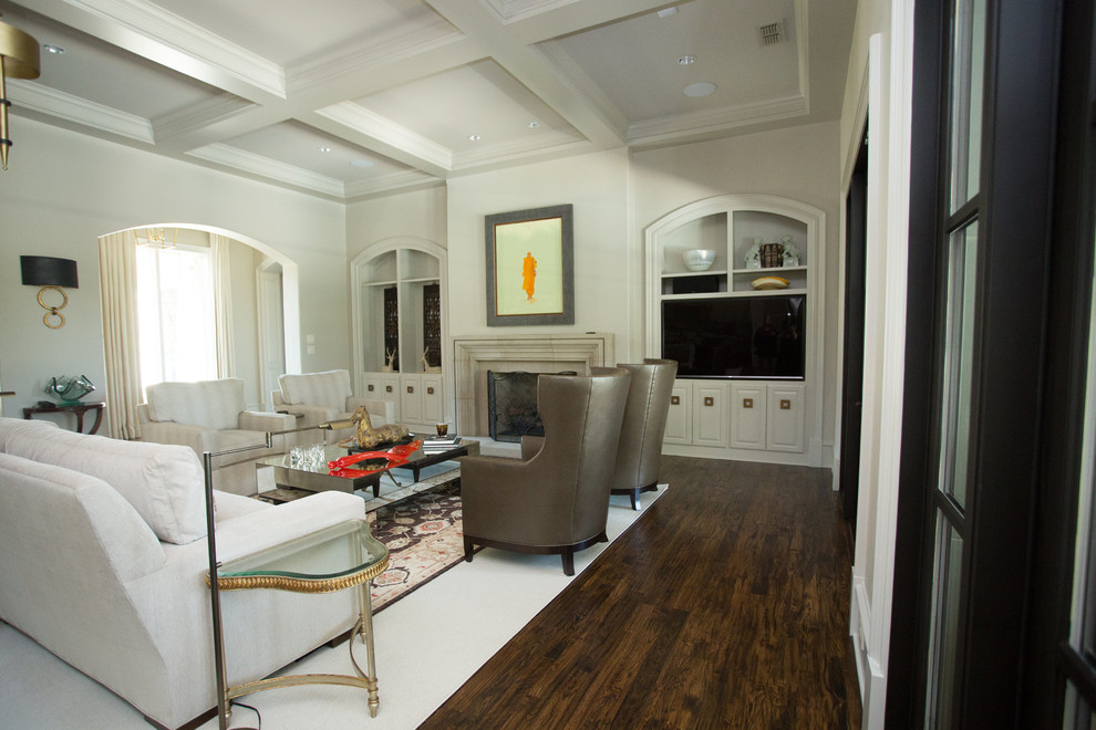 Example of a small transitional formal and enclosed dark wood floor living room design in Austin with white walls, a standard fireplace, a stone fireplace and a media wall