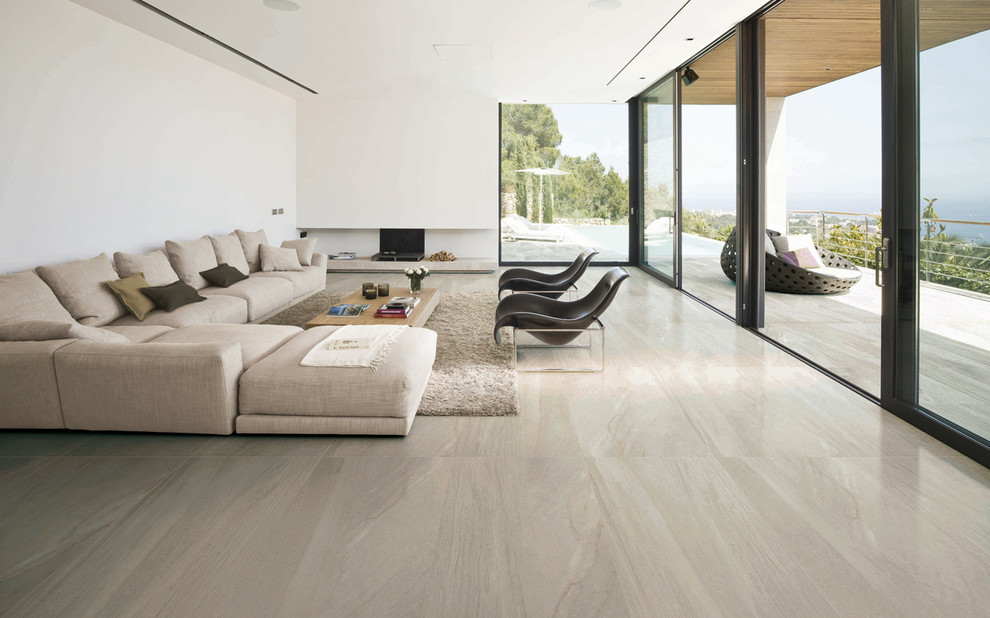 This is an example of a large modern living room in San Diego with white walls and ceramic flooring.