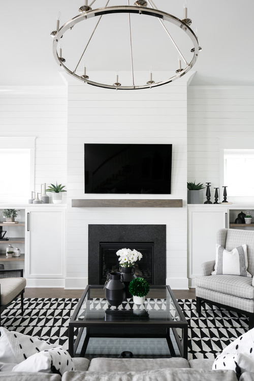 Fireplace Ideas With TV Above; Enjoy the warmth next to a burning fire
while watching your favorite movie or show with these living room ideas!