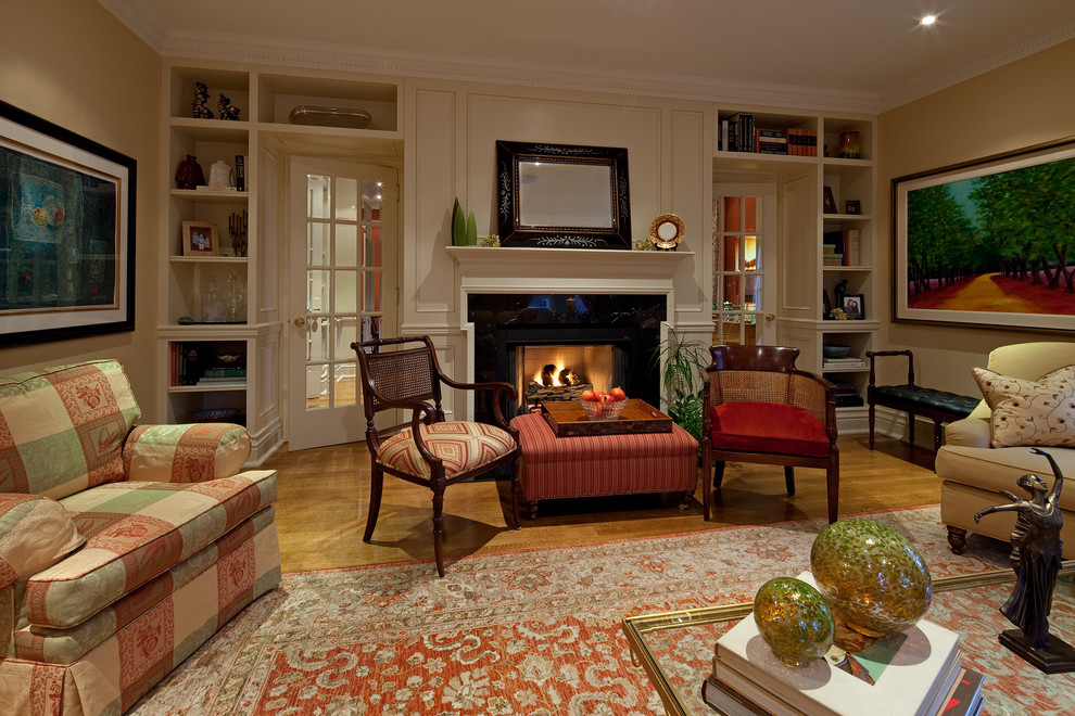 Inspiration for a classic living room in Toronto with beige walls and a standard fireplace.