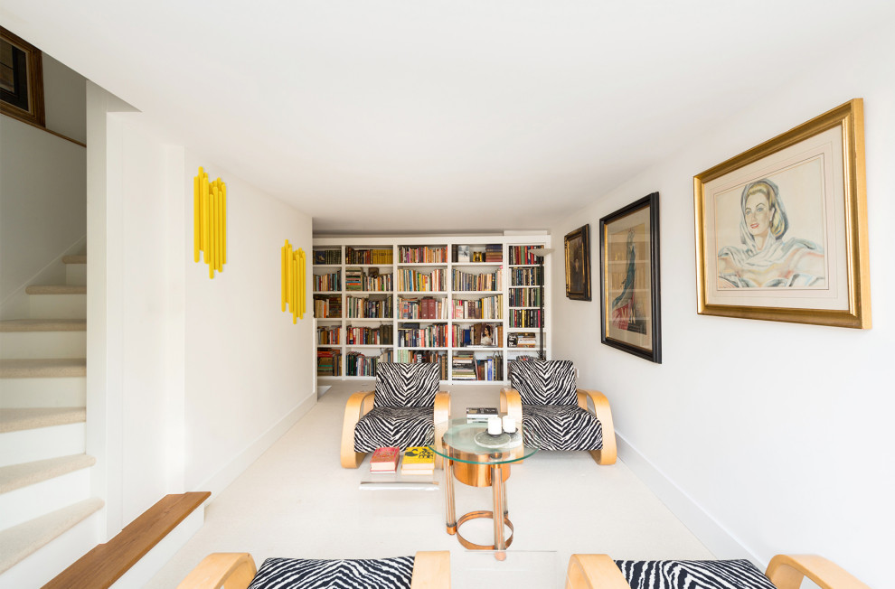 Photo of a medium sized eclectic formal open plan living room with no tv, white walls and white floors.