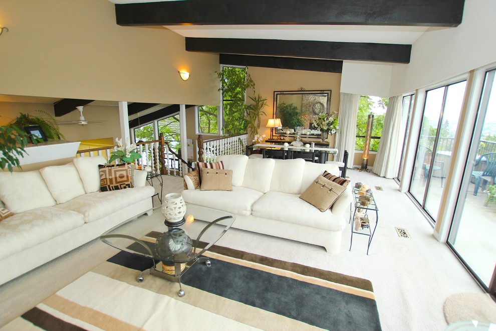 Example of a trendy open concept carpeted living room design in Vancouver