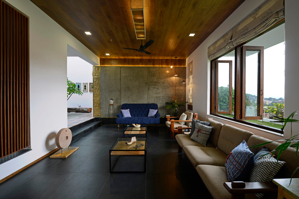 Идея дизайна: гостиная комната среднего размера в современном стиле с белыми стенами, бетонным полом и серым полом