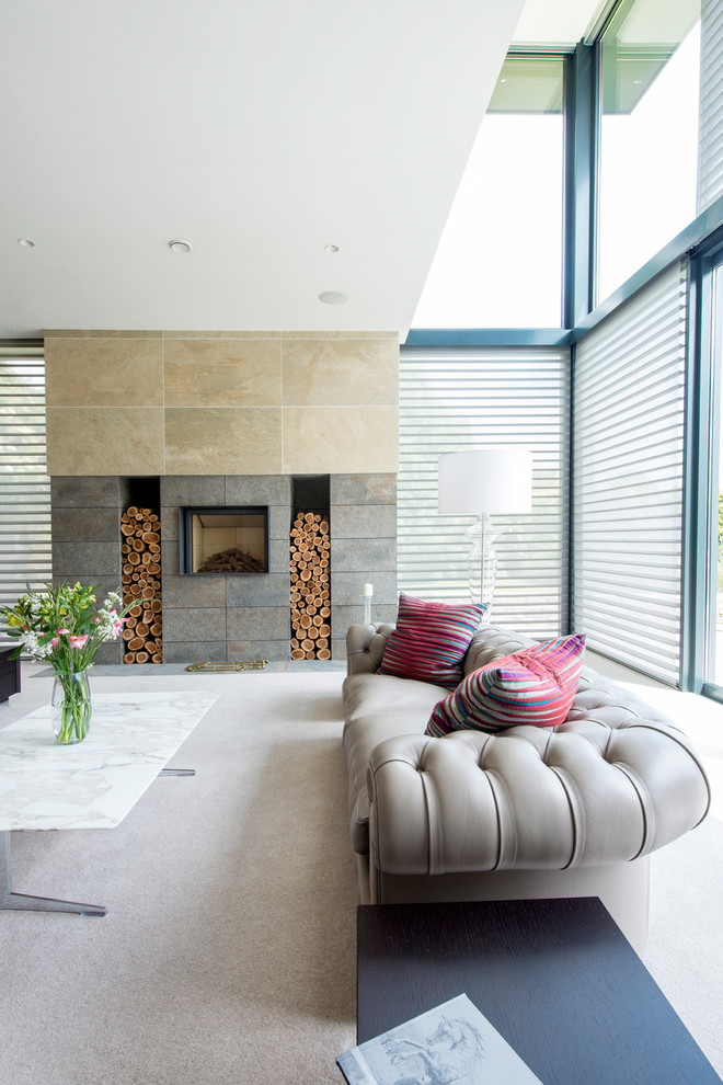 Contemporary living room in Dorset with a standard fireplace.