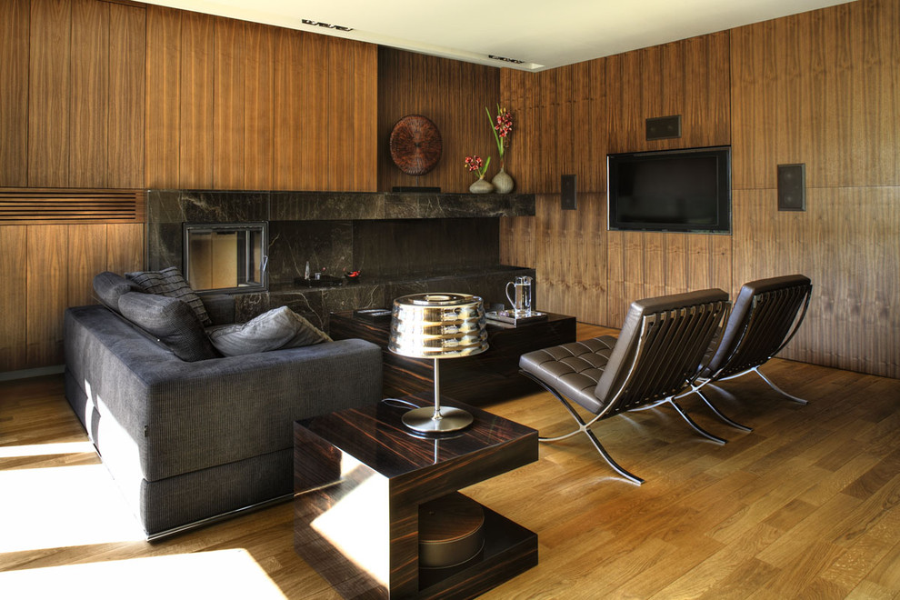 Idee per un soggiorno minimal di medie dimensioni con parete attrezzata