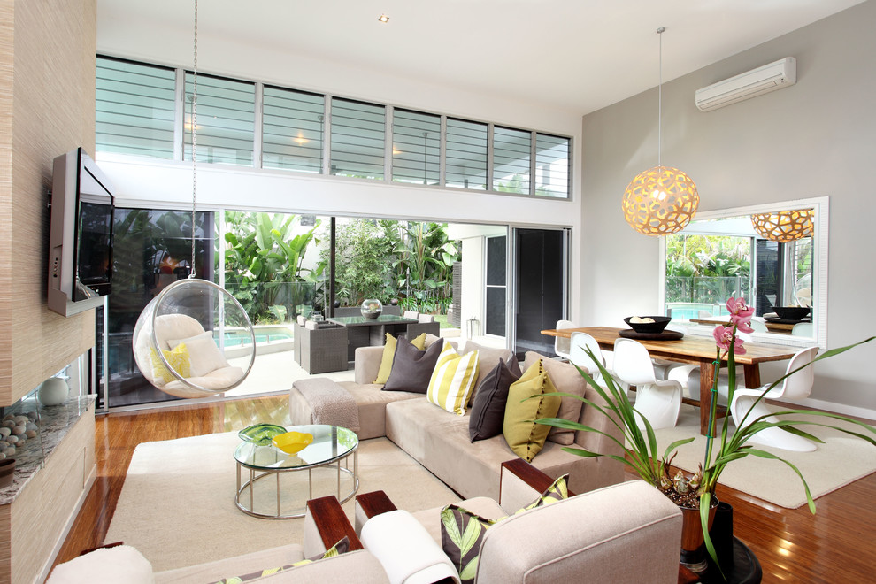 Inspiration for a contemporary living room in Brisbane with grey walls.