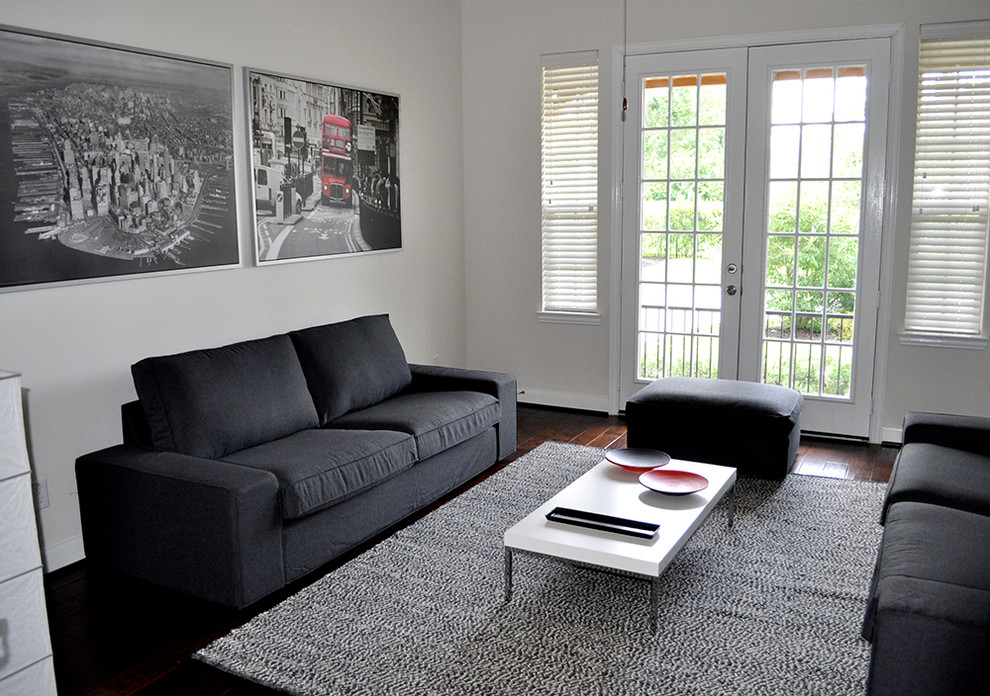 Example of a trendy living room design in Miami with white walls