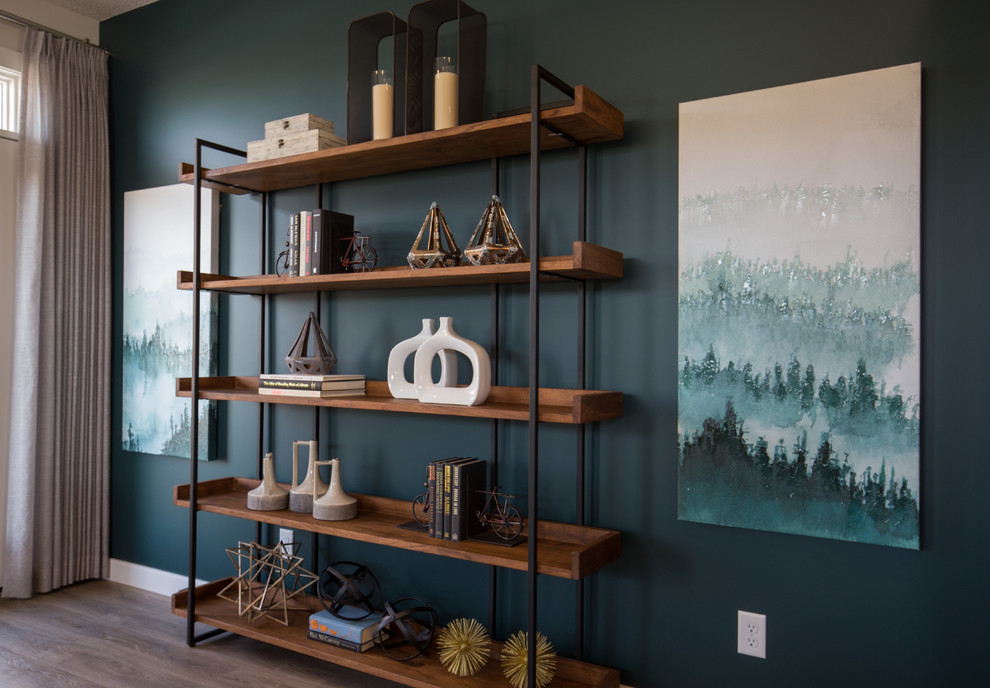 Inspiration for a mid-sized formal and open concept medium tone wood floor living room remodel in Calgary with blue walls and a wall-mounted tv