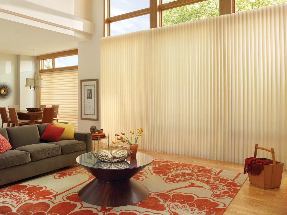 Ispirazione per un grande soggiorno eclettico con sala formale, pareti beige e moquette