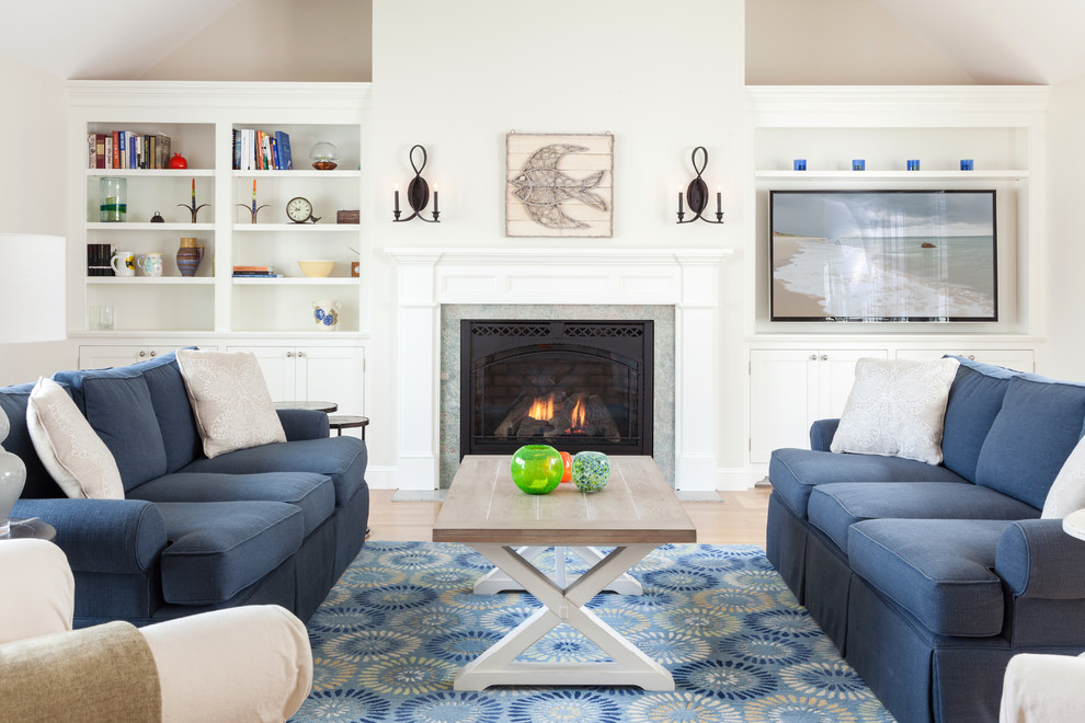 Beach style living room photo in Boston with a standard fireplace