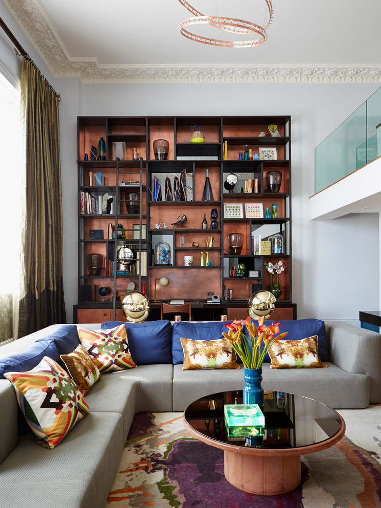 Living room - large contemporary open concept living room idea in London with gray walls