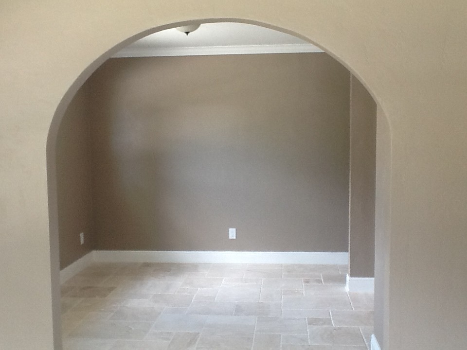 Photo of a small modern open plan living room in Tampa with beige walls and no tv.