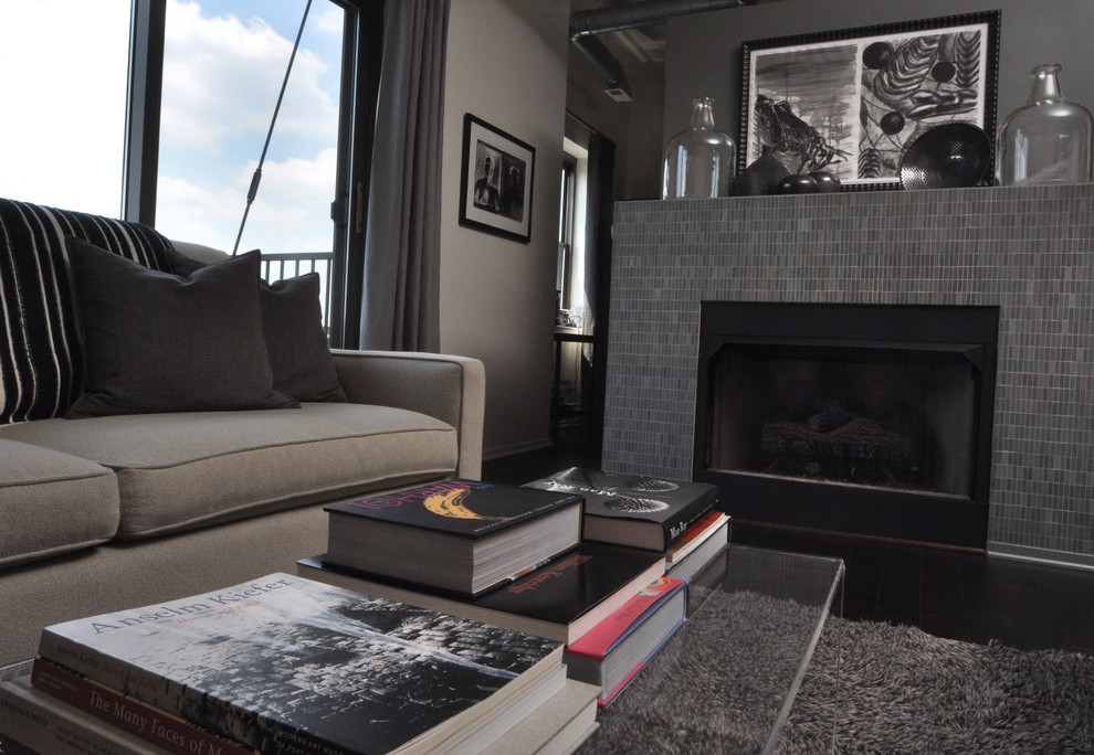 Trendy living room photo in Chicago with a tile fireplace