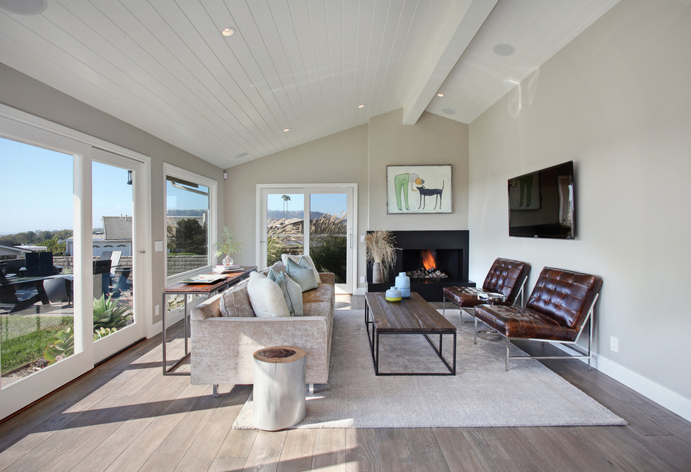 Inspiration for a transitional gray floor living room remodel in Orange County with beige walls