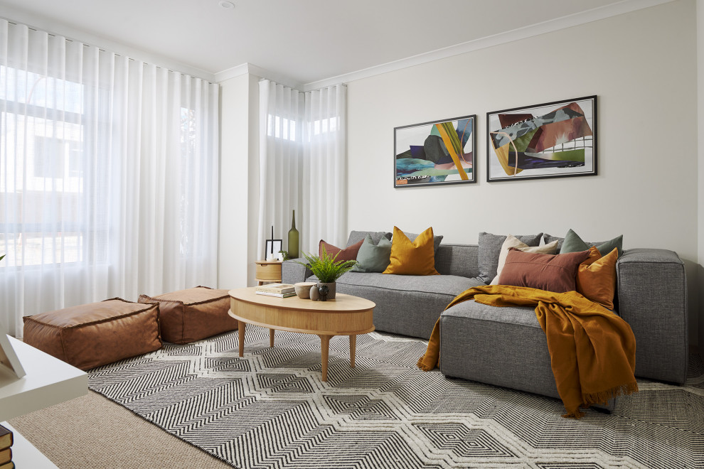 Example of a beach style living room design in Perth
