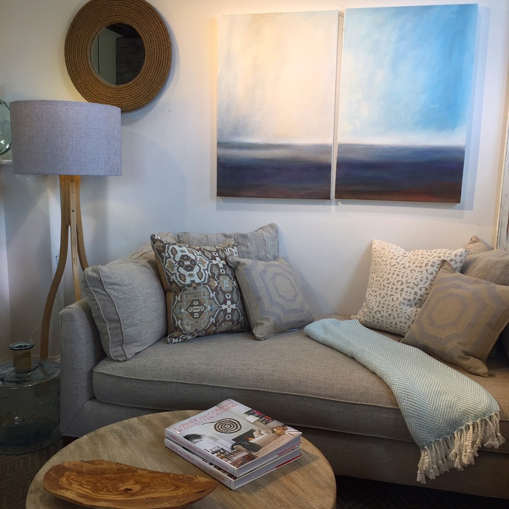 Photo of a small nautical formal enclosed living room in Boston with white walls and carpet.