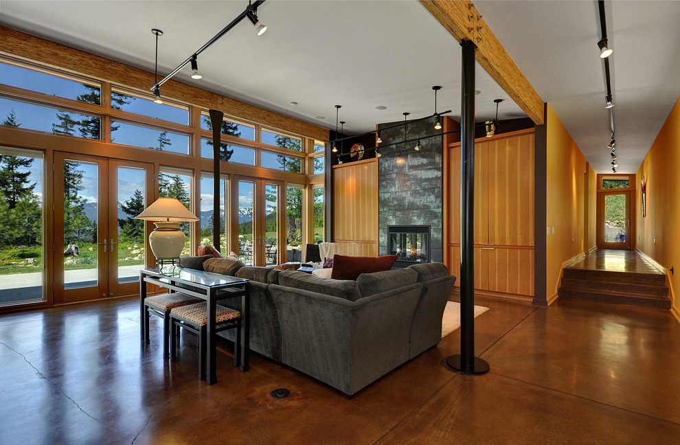 Living room - contemporary concrete floor living room idea in Seattle