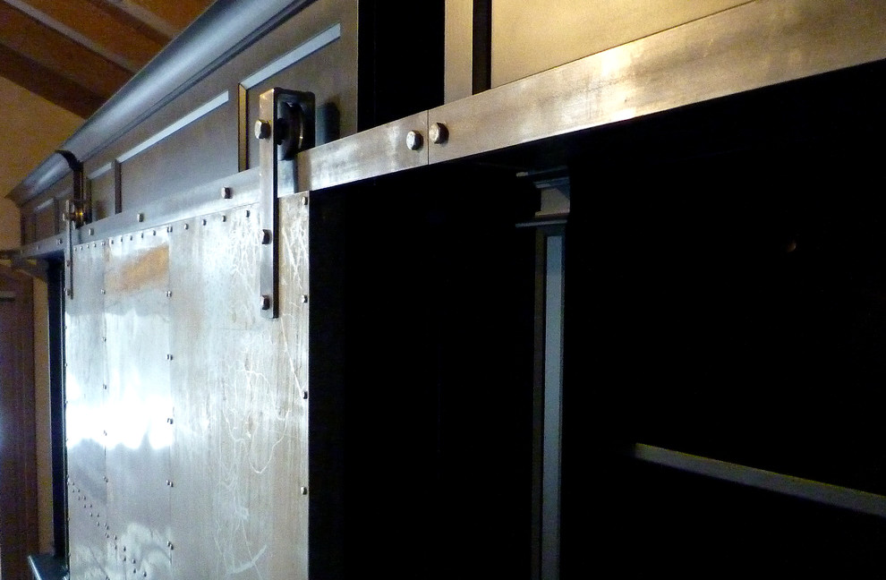 Industrial style media unit for a chalet in the French Alps Industrial Living Room Kent