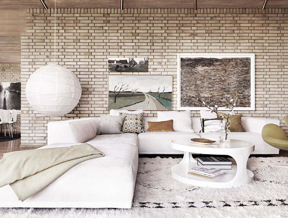 Großes, Fernseherloses, Offenes Modernes Wohnzimmer ohne Kamin mit beiger Wandfarbe und braunem Holzboden in Malmö