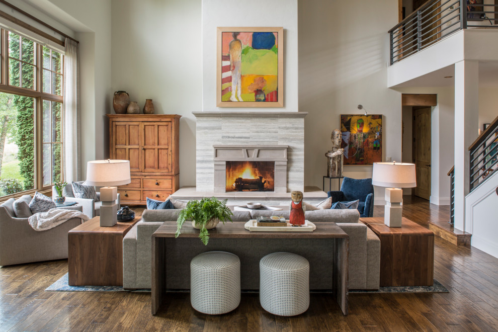 Mid-sized transitional open concept dark wood floor and brown floor living room photo in Other with white walls, a standard fireplace and a stone fireplace