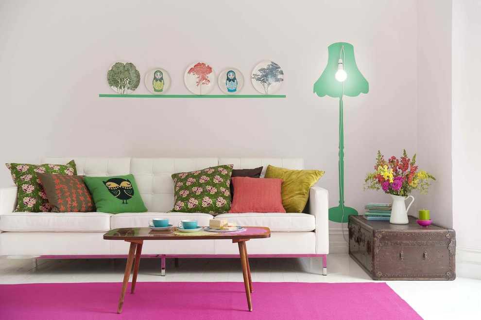 Example of an eclectic formal painted wood floor living room design in Toronto with white walls