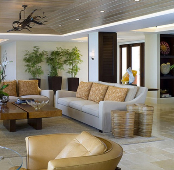 Photo of a large contemporary formal open plan living room in Miami with white walls, travertine flooring, no fireplace and no tv.