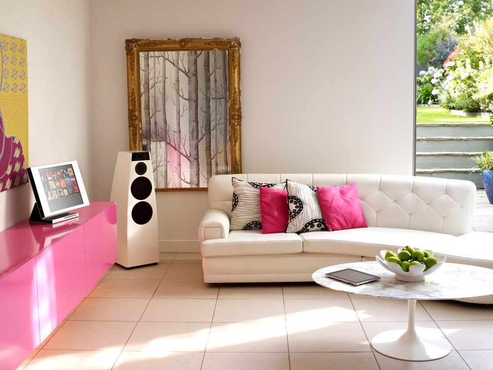 Example of a mid-sized trendy enclosed carpeted living room design in St Louis with a music area, pink walls and no tv