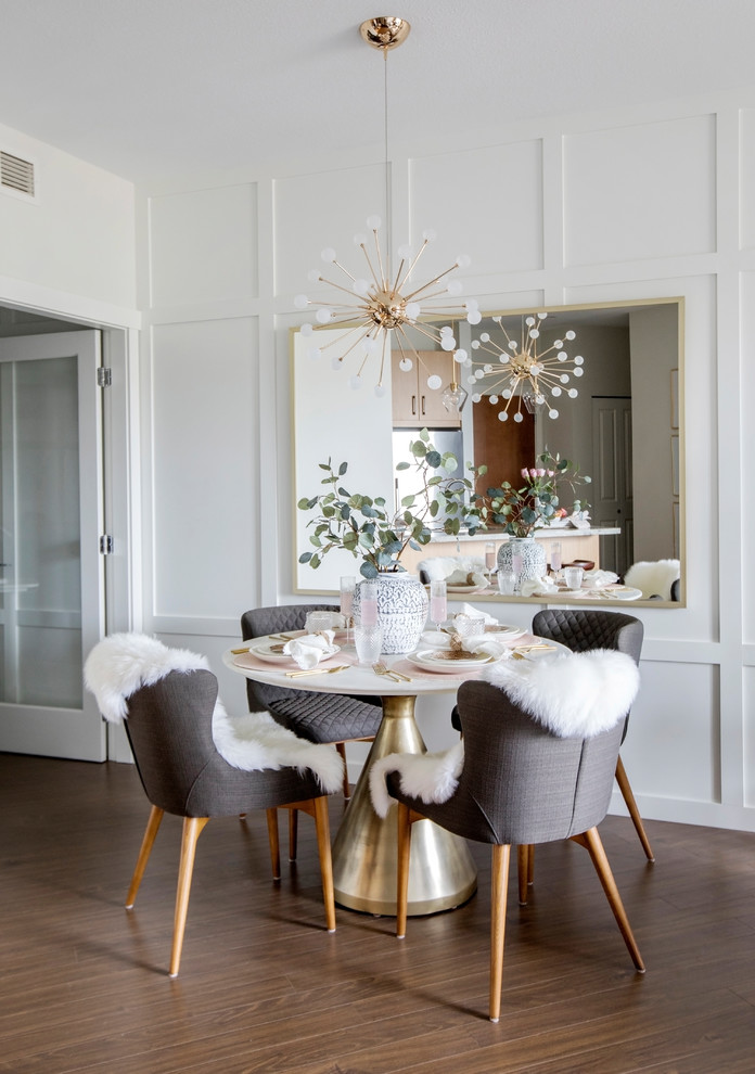 Photo of a small dining room in Vancouver with white walls.