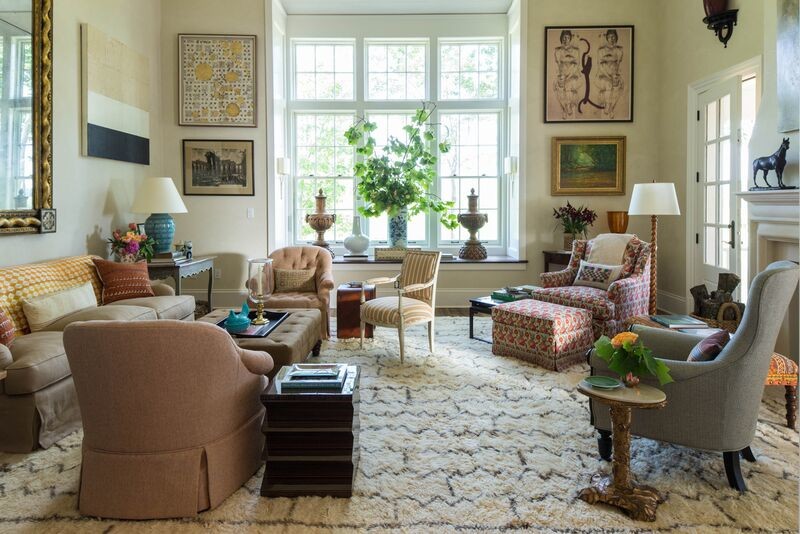 Example of a large eclectic formal and open concept carpeted living room design in New York with beige walls, no fireplace and no tv