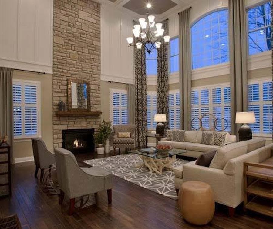 Living room - mid-sized traditional enclosed dark wood floor and brown floor living room idea in Dallas with beige walls, a standard fireplace and a stone fireplace