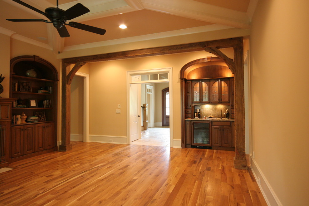 This is an example of a rustic living room in Raleigh.