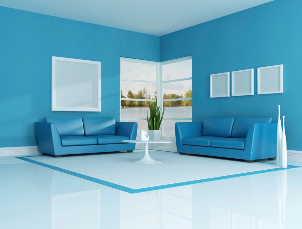 Cette photo montre un grand salon moderne ouvert avec un mur bleu et un sol en marbre.