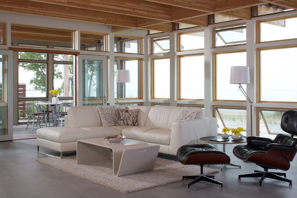 Ispirazione per un soggiorno minimal di medie dimensioni e aperto con pareti bianche, sala formale e pavimento con piastrelle in ceramica