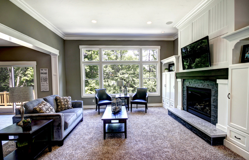Inspiration for a modern living room in Grand Rapids with feature lighting.