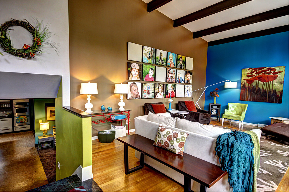 Living room - eclectic loft-style living room idea in Grand Rapids with multicolored walls