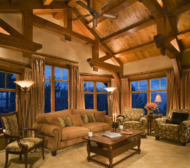 Living room - large rustic formal and enclosed carpeted and beige floor living room idea in Other with beige walls, no fireplace and no tv
