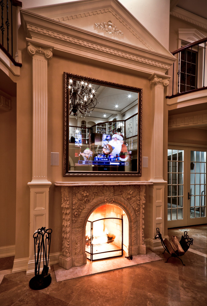 Example of a large classic formal medium tone wood floor living room design in Chicago with beige walls, a standard fireplace, a stone fireplace and a media wall