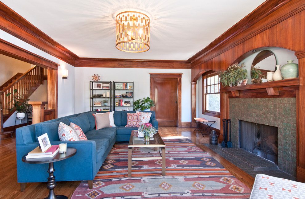 Design ideas for a traditional living room in Los Angeles with a tiled fireplace surround.
