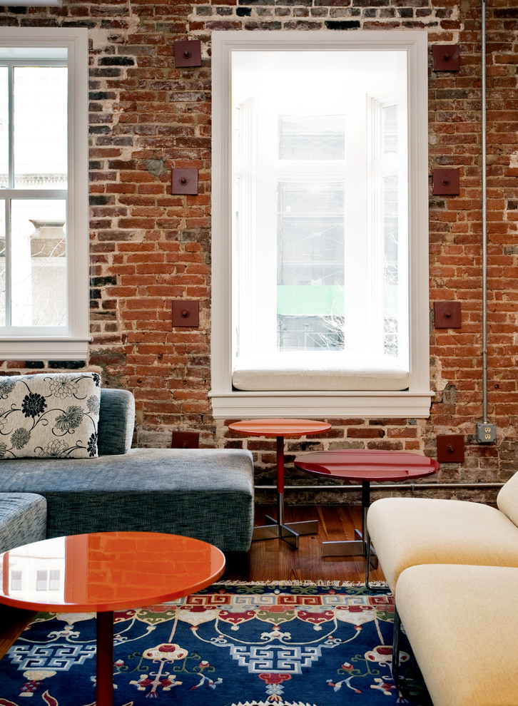 Living room - eclectic living room idea in Baltimore with red walls