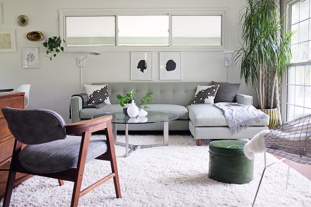 Living room - 1950s living room idea in New York with white walls