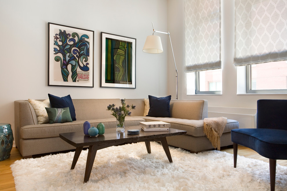 Trendy living room photo in Tampa with white walls