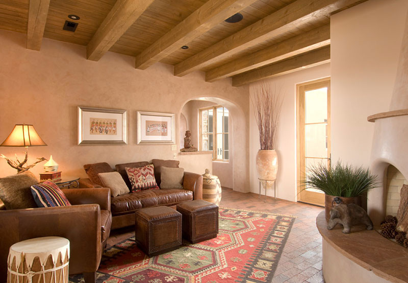 Пример оригинального дизайна: открытая, парадная гостиная комната среднего размера в стиле фьюжн с кирпичным полом, фасадом камина из бетона, бежевыми стенами, угловым камином и коричневым полом без телевизора