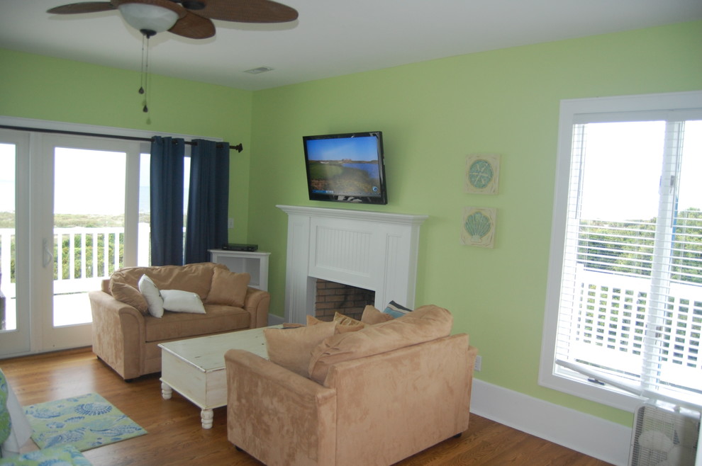 Living room - tropical living room idea in Charleston