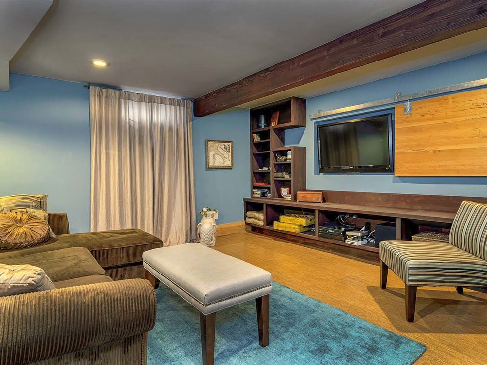 Mid-sized trendy cork floor living room photo in Portland with blue walls
